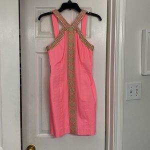 Coral party dress with gold metallic trim, size 0.
